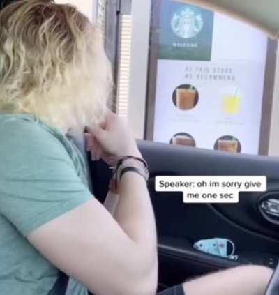 A deaf person ordering at a Stuckbucks drive thru