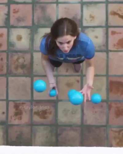 Juggling some blue balls