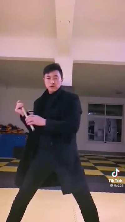 Fast nunchaku tricks.