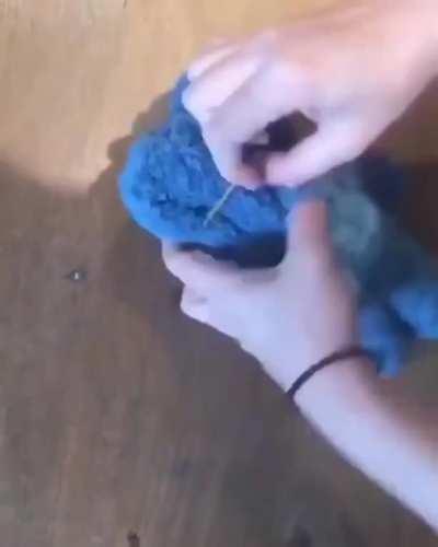 Making a teddy bear out of a wash cloth/towel.