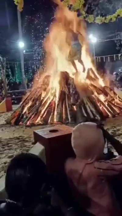 a ritual in South India where you run through a raging bonfire..