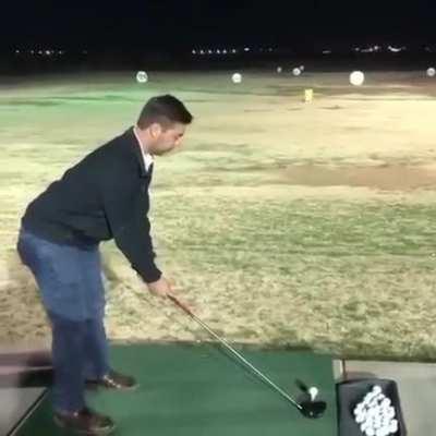 Guy takes a swing at it