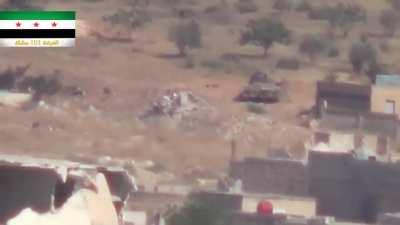 FSA BGM-71 TOW strike to the rear of a Syrian Army tank - Queri Checkpoint, Wadi al-Deif - 7/9/2014