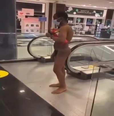 Naked guy at the Mall gets whacked by a dude who's seen enough dick & ass for the day