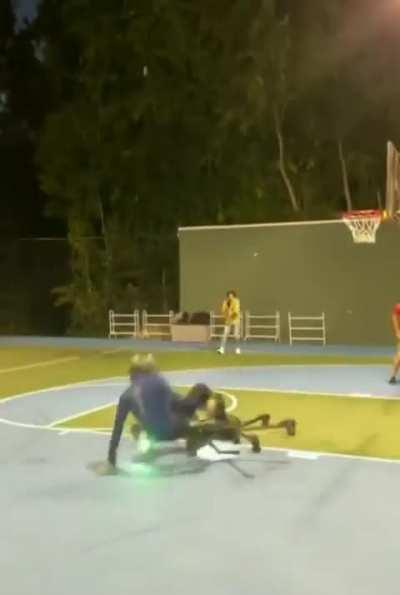 green goblin playing basketball