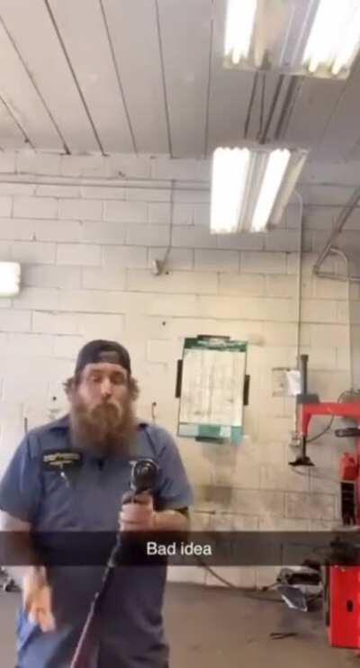 Attaching a wrench to a power drill