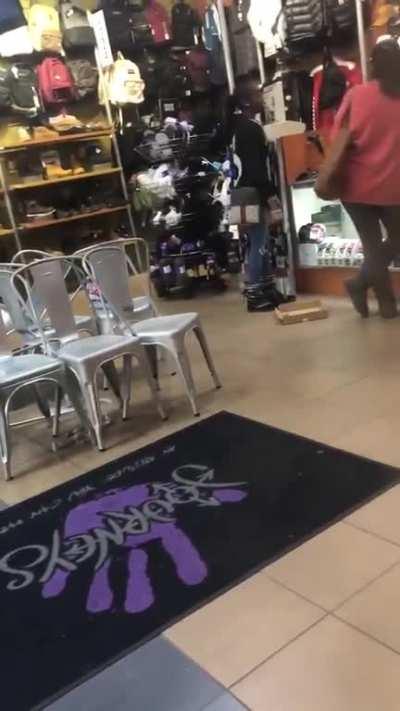 Couple have a complete meltdown in a shoe store