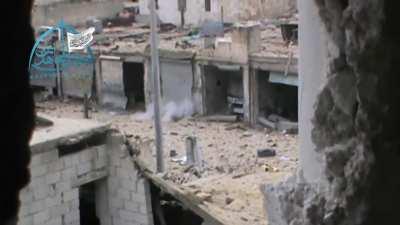 FSA using an improvised cannon to blow open an SAA held garage - Ramousah District, Aleppo - 2014