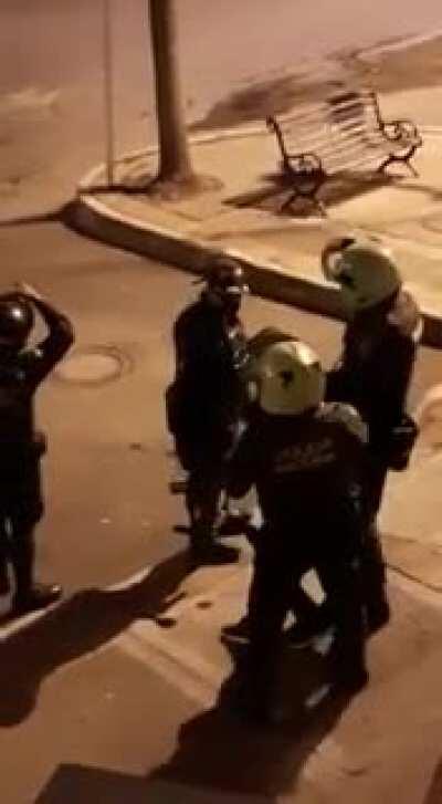 Colombian police shooting rubber bullets to a protestor in Bogotá. (citizens are protesting against police brutality after a man was brutalized by police)