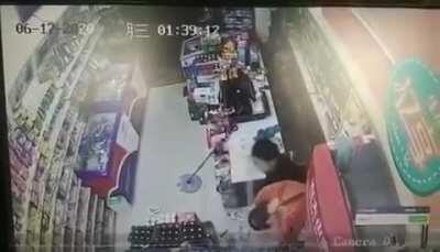 Thief knocked out by shop owner with mutiple beer bottle hits to the head