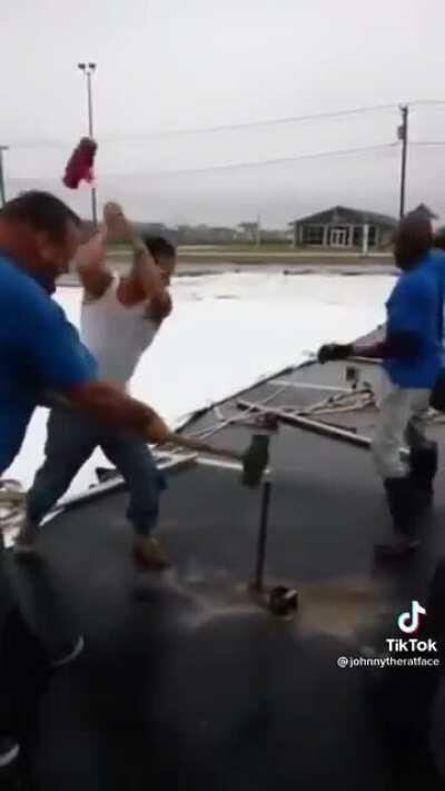 The coordination and rhythm between these men hammering the rod