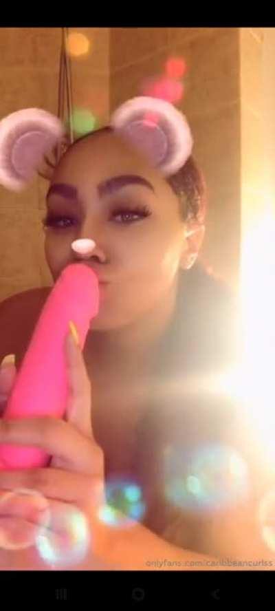 Caribbeancurlss Sucks Dildo