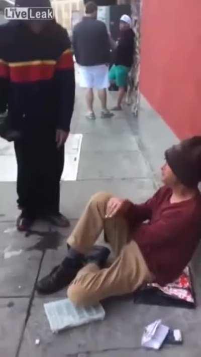 Cracked out loser shoves a wad of HUMAN feces into a homeless person's face