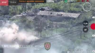 Ukrainian drone records a Russian mechanized attack on the southern part of Krasnohorivka; Ukrainian artillery or mines takes out several vehicles and some Russian soldiers were able to be dropped off (April 2024)