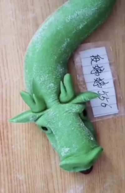 Chef makes a dragon out of Mochi (Japanese rice cake)