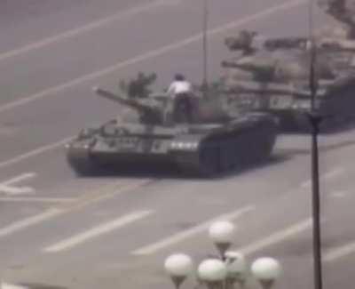 Tank Man, June 5th, 1989. This was the day after the Tiananman Square massacre.