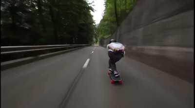 70mph (113km) Longboarding down Swiss Alps.