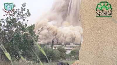 Islamic Front engineering team detonates a massive tunnel bomb underneath a Syrian Army checkpoint near Ma'arrat al-Nu'man - 5/5/2014