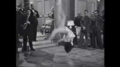 Miriam LaVelle flipping in heels, 1944