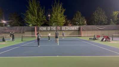 Tennis doubles player freaks out after ball is hit towards her