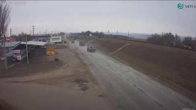 Russian convoy passage, then soldiers taking cams on highway P47 - another guy comes to check camera is pointed downwards