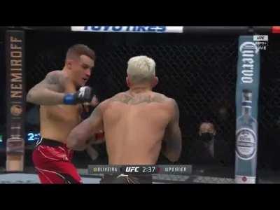 Charles Oliveira and Dustin Poirier technical banging from the opening bell of round 1. They combined for over 100 signinifcant strikes landed in the first round!