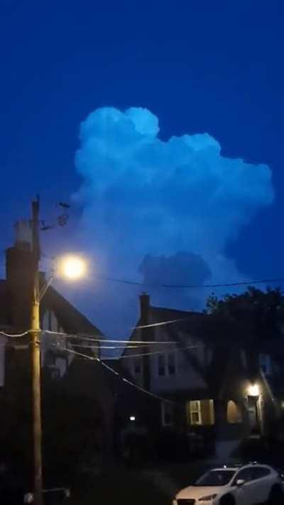 This crazy cloud full of lightening outside my house right now.