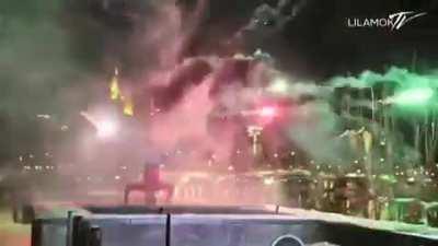 Dude's launching fireworks while breakdancing