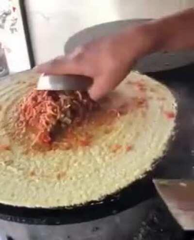 making of dosa Indian dish