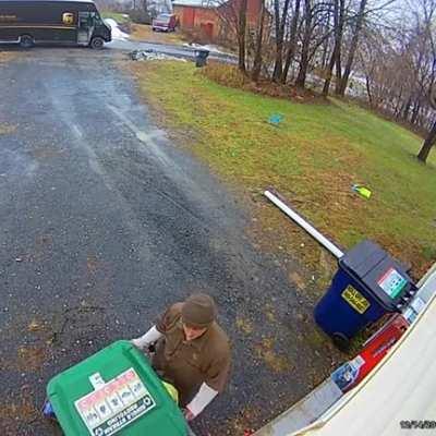 UPS delivery man goes the extra level to hide the package.