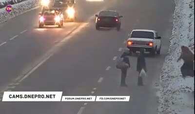 WCGW if jaywalking on a busy icy road with an unleashed dog?