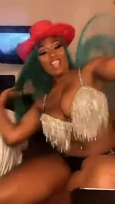 Megan Thee Stallion riding an imaginary cock