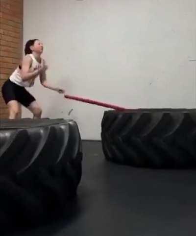 Woman hitting tire with sledgehammer fail