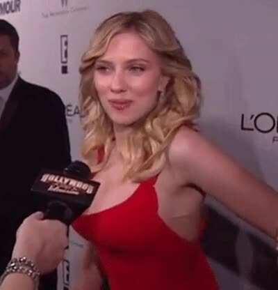 Scarlett Johansson and that classic, cleavage-enriching, astonishing red dress