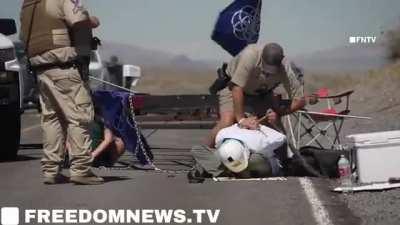 BREAKING: Tribal Rangers trucks in Nevada just RAMMED a climate change group blocking the road and mass arrested all of them