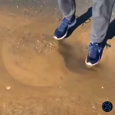 Water pocket under sand