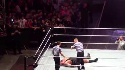 Big Show won't wake up after a match, so the referees try to put themselves over