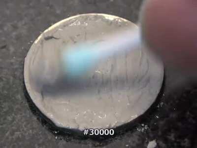 Polishing 10 yen coin