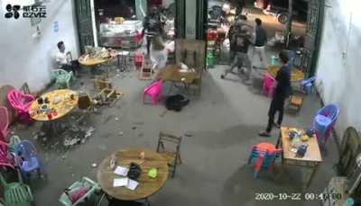 Gang attack on a Chinese restaurant - attackers are carrying Guandao (pole with blade).