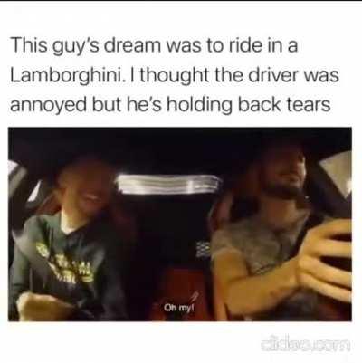 This guy's dream was to ride in a Lamborghini. I thought the driver was annoyed he's holding back tears