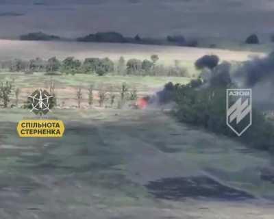 Azov FPV drone destroys russian IFV while another drone films the detonation