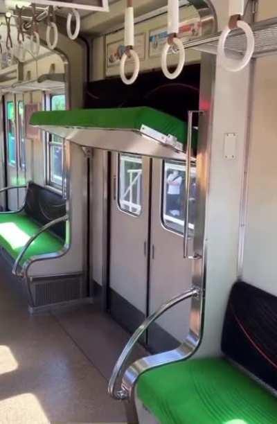 Motorized extra train seat in Japan