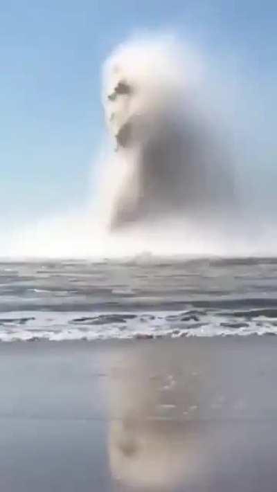 Godzilla emerging from the ocean