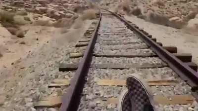 This guy built a rail cart and rides it along abandoned railroad tracks in Southern CA