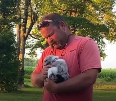 Man's family surprised him with a new puppy