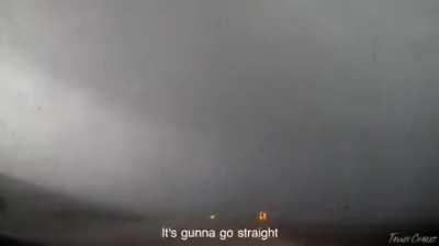 Amateur storm chasers encounter with tornado.