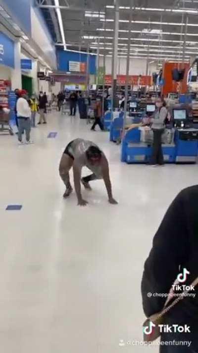 Man Screams and pours milk on himself in Walmart