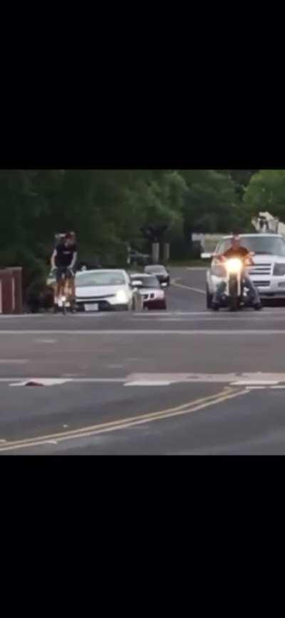 Bicyclist has had enough of Harleys loud revs.