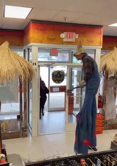 scarecrow scares the hell out of this woman