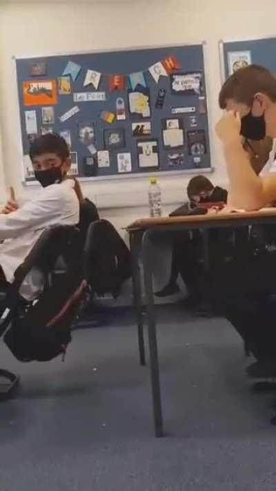 This kid falling off his chair on purpose